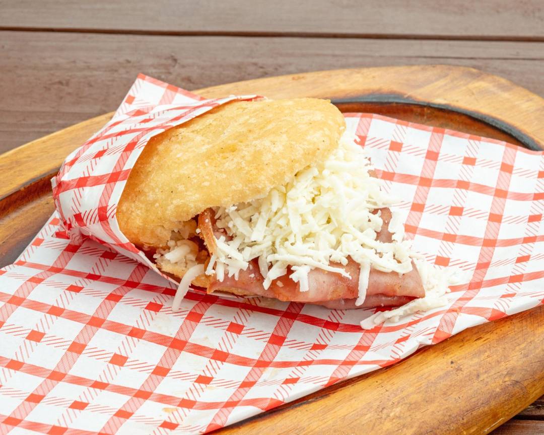 Arepa stuffed with grilled mortadella slices