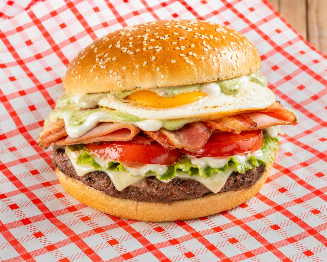 Special burger with bacon, tomato and sauces